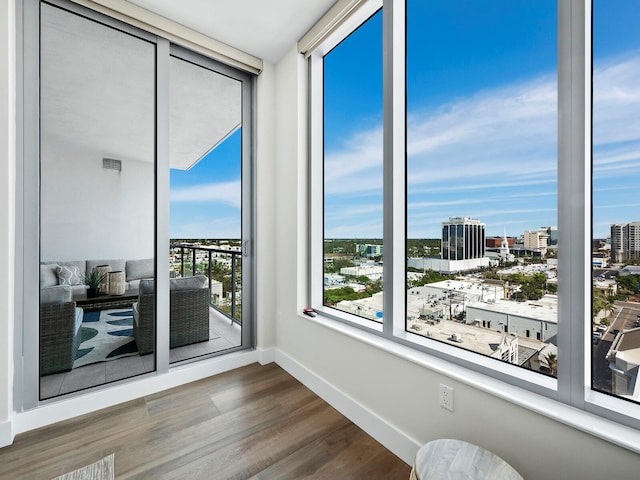 unfurnished room featuring hardwood / wood-style flooring