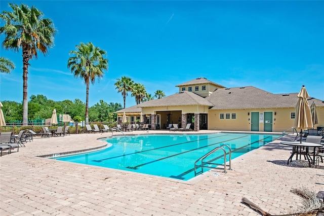 view of swimming pool with a patio area