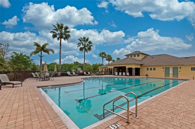 view of swimming pool featuring a patio