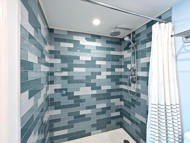 bathroom with a shower with shower curtain