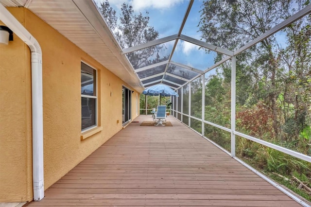 unfurnished sunroom with lofted ceiling