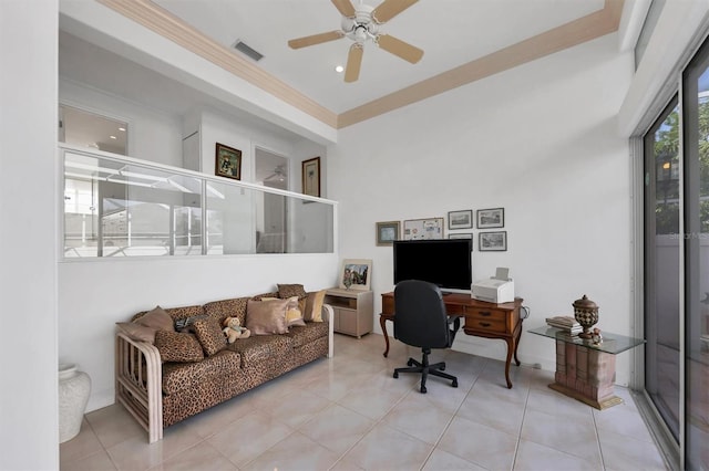 tiled office space with ceiling fan