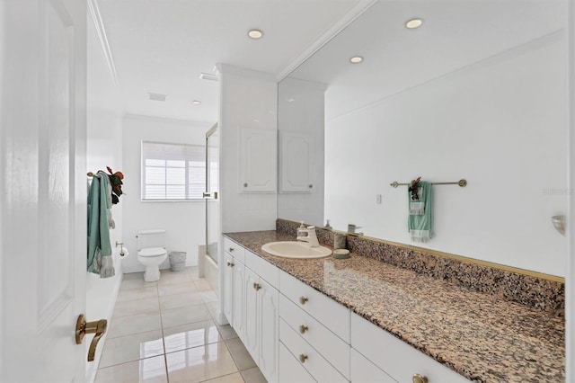 full bathroom with vanity, bathing tub / shower combination, tile patterned floors, crown molding, and toilet