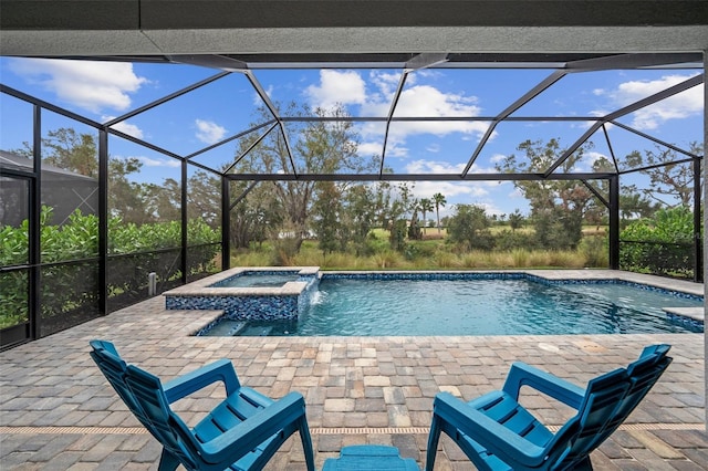 view of pool featuring a lanai, an in ground hot tub, pool water feature, and a patio