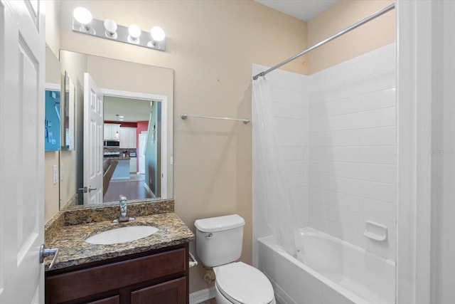 full bathroom featuring toilet, shower / tub combo, and vanity