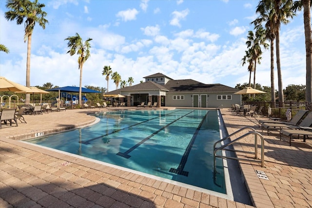 view of swimming pool featuring a patio area