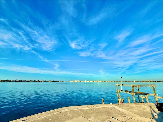 dock area featuring a water view