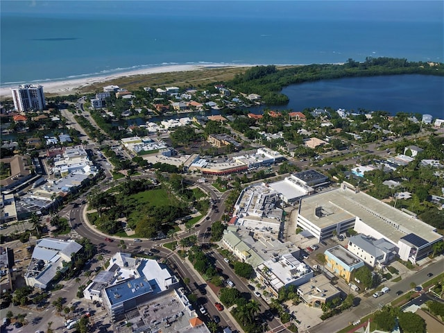 bird's eye view with a view of the beach and a water view