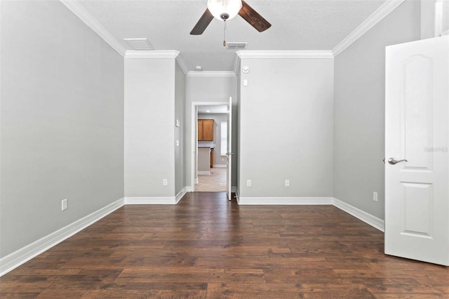 unfurnished room with ceiling fan, crown molding, a textured ceiling, and dark hardwood / wood-style flooring