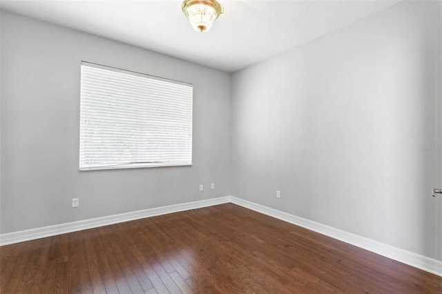 unfurnished room featuring hardwood / wood-style floors