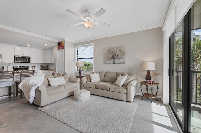 tiled living room featuring ceiling fan and crown molding