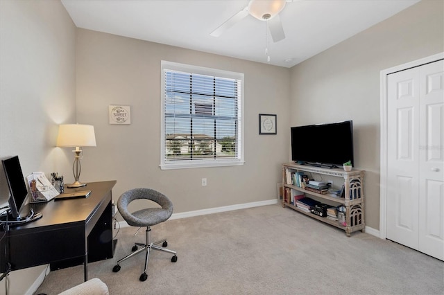 office featuring light colored carpet and ceiling fan