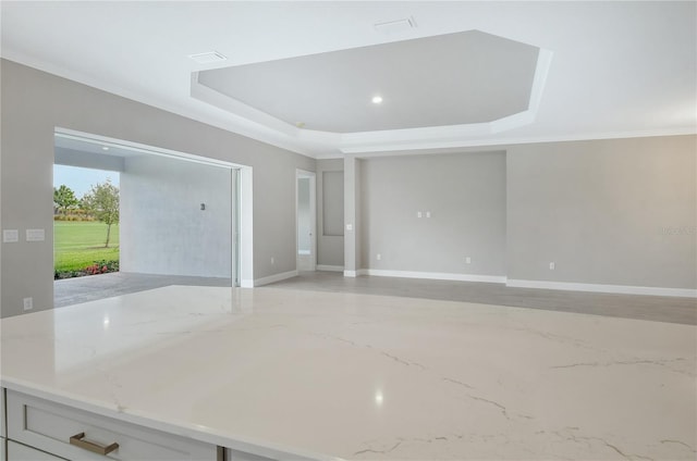 15625 San Lazzaro Ave, Bradenton, FL 34211 - spare room with a raised ceiling and baseboards