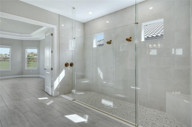 bathroom featuring tiled shower