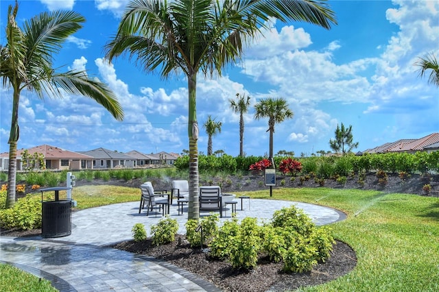15625 San Lazzaro Ave, Bradenton, FL 34211 - view of community with a patio, a yard, and a residential view