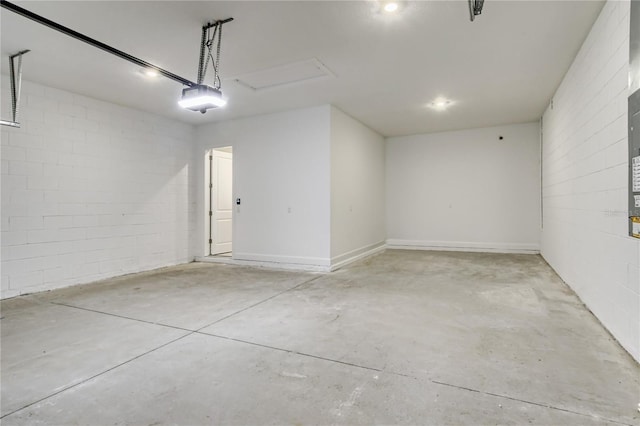 15625 San Lazzaro Ave, Bradenton, FL 34211 - garage with concrete block wall and a garage door opener