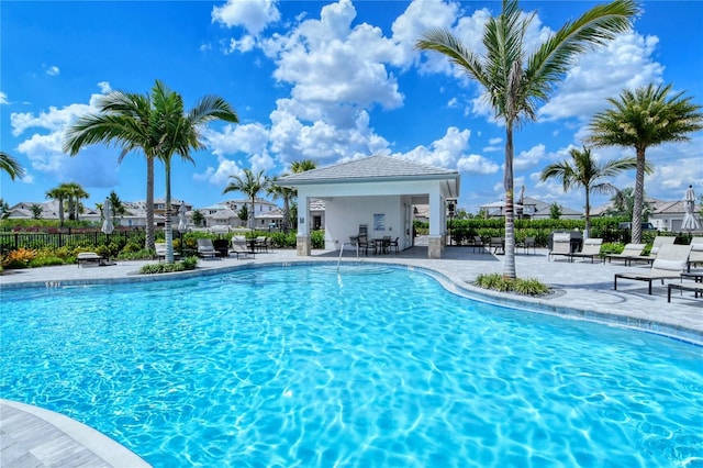 15625 San Lazzaro Ave, Bradenton, FL 34211 - community pool with a patio area and a residential view