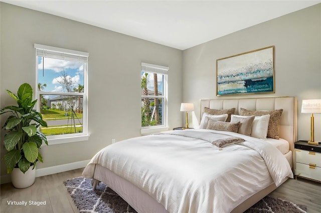 bedroom featuring light hardwood / wood-style flooring