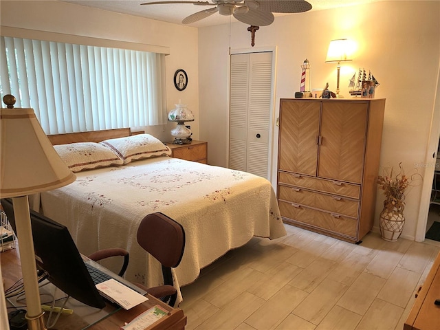 bedroom with a closet, ceiling fan, and light hardwood / wood-style flooring