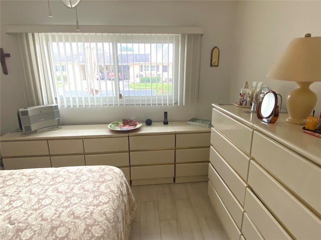 bedroom featuring light hardwood / wood-style floors