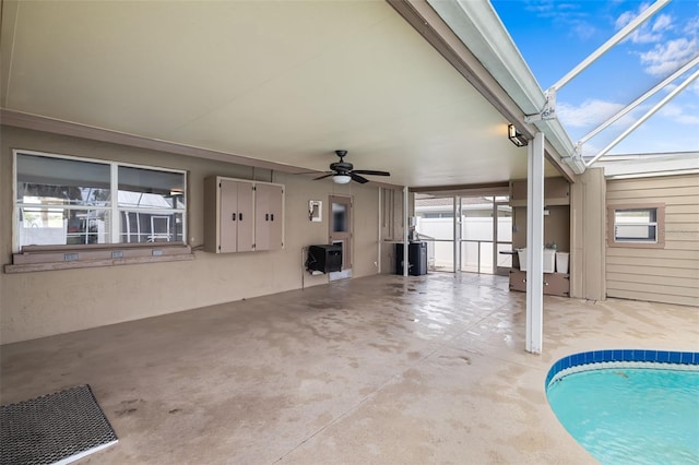 interior space featuring ceiling fan and a lanai