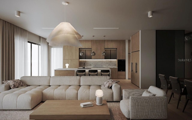 carpeted living room featuring sink