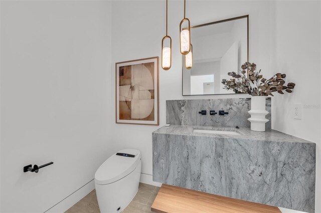 2038 Datura St, Sarasota, FL 34239 - half bath with toilet, tile patterned flooring, and a sink
