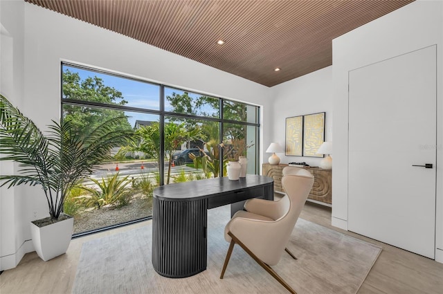 2038 Datura St, Sarasota, FL 34239 - home office featuring light wood-style flooring and recessed lighting