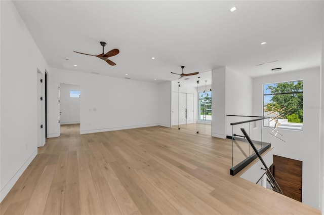 2038 Datura St, Sarasota, FL 34239 - spare room with ceiling fan, baseboards, light wood-type flooring, and recessed lighting