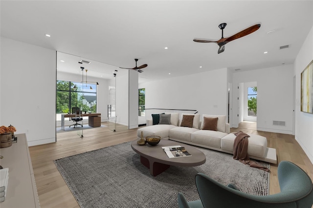2038 Datura St, Sarasota, FL 34239 - living room with light wood-type flooring, a ceiling fan, visible vents, and recessed lighting
