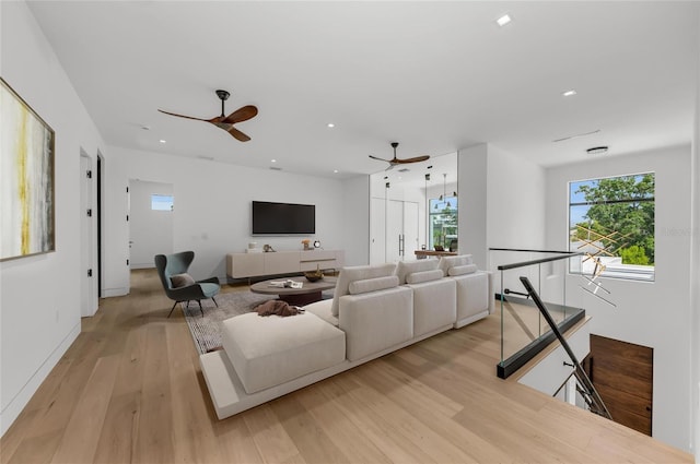 2038 Datura St, Sarasota, FL 34239 - living area featuring light wood-style flooring, a ceiling fan, and recessed lighting
