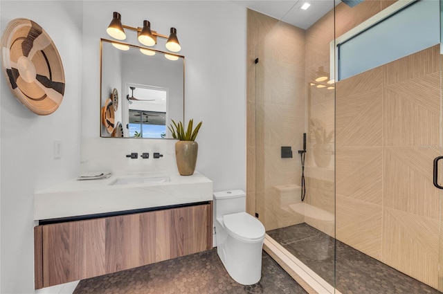 2038 Datura St, Sarasota, FL 34239 - bathroom featuring vanity, toilet, and a tile shower