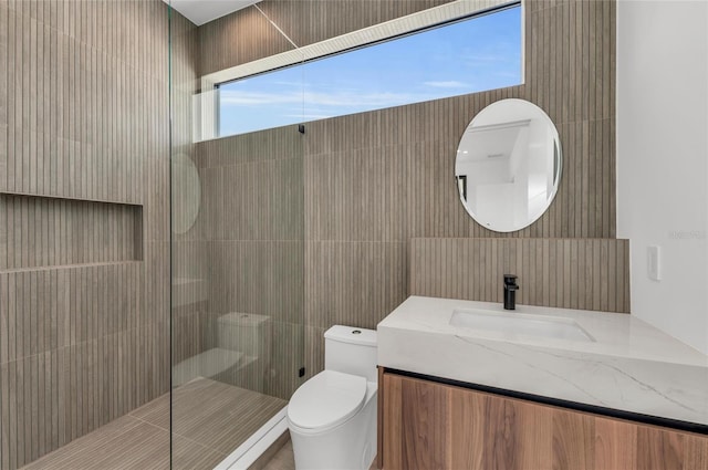 2038 Datura St, Sarasota, FL 34239 - bathroom with toilet, tiled shower, and vanity