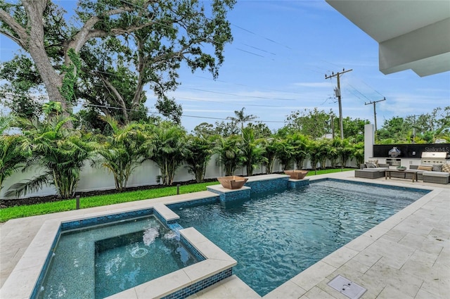 2038 Datura St, Sarasota, FL 34239 - view of pool featuring a fenced backyard, a patio, outdoor lounge area, and a pool with connected hot tub