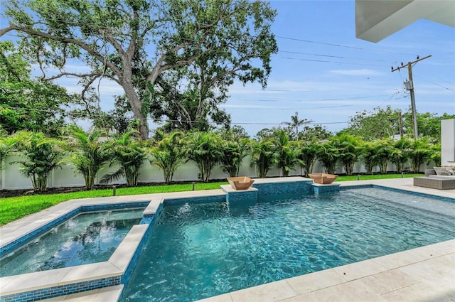 2038 Datura St, Sarasota, FL 34239 - view of swimming pool featuring a pool with connected hot tub and a fenced backyard