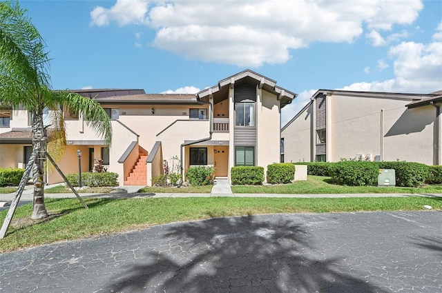 view of front of property with a front lawn