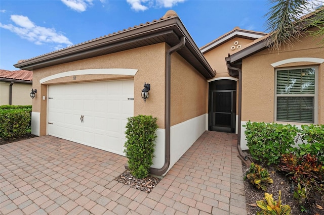 exterior space with a garage