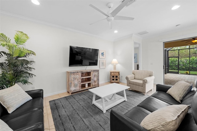 living room with ceiling fan, light tile patterned floors, and crown molding