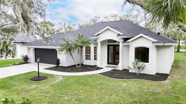 ranch-style house with a front lawn, a garage, and french doors