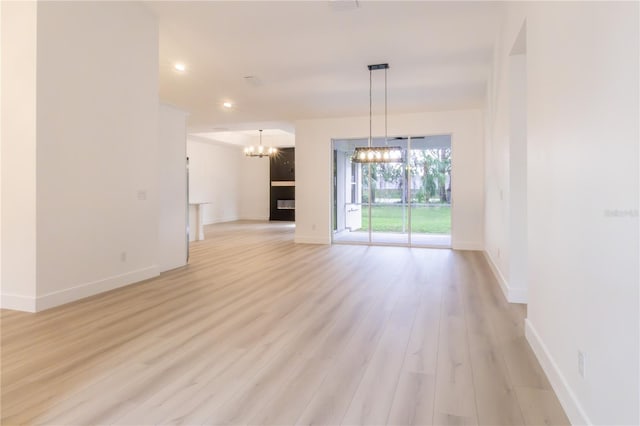 unfurnished living room with light wood-type flooring