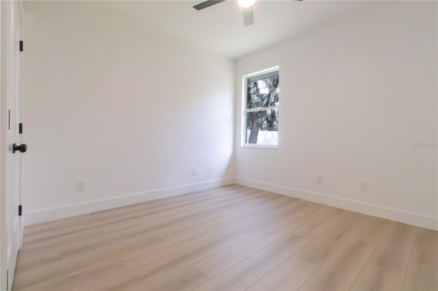 unfurnished room featuring light hardwood / wood-style flooring and ceiling fan