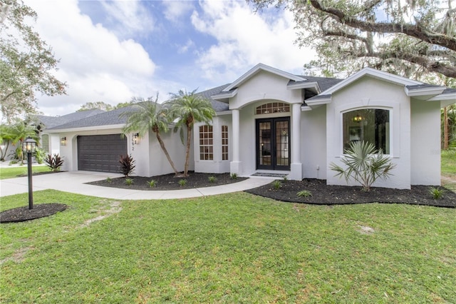 single story home featuring a garage and a front yard