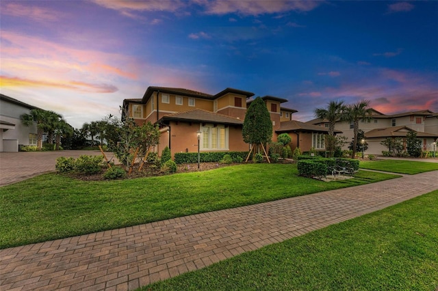 view of front of home featuring a yard