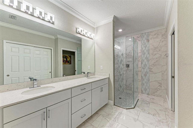 bathroom with a shower with door, a textured ceiling, and crown molding