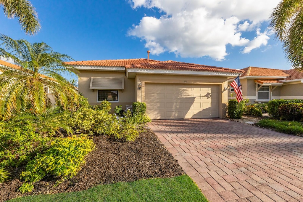 view of front of home with a garage