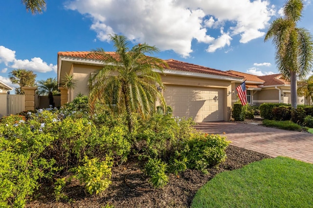 mediterranean / spanish-style house featuring a garage