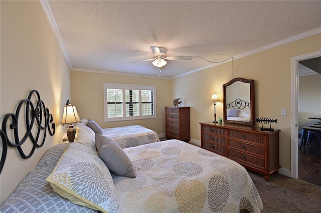 carpeted bedroom with ceiling fan, a textured ceiling, and crown molding