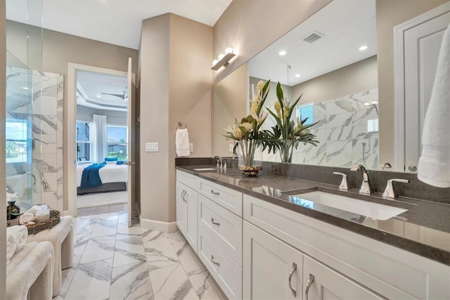 bathroom with vanity and walk in shower