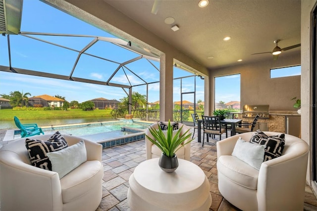 view of patio / terrace featuring ceiling fan, a lanai, grilling area, area for grilling, and a water view