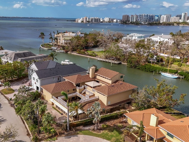 birds eye view of property featuring a water view